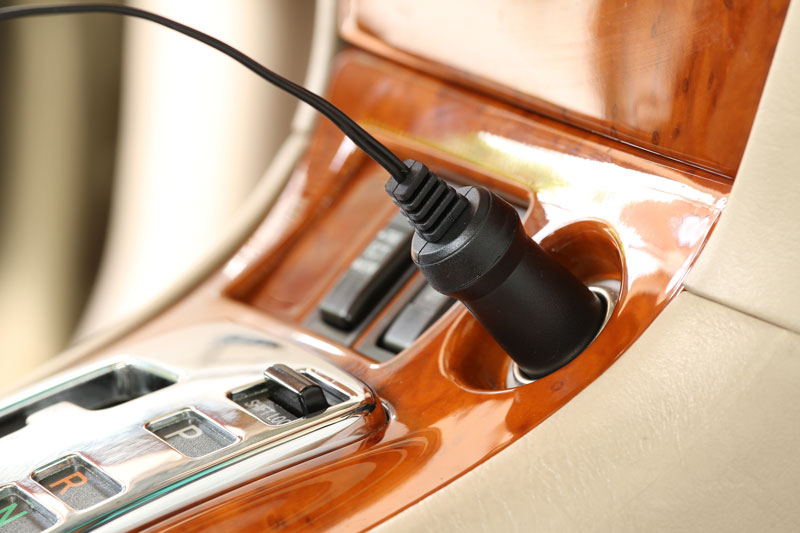 Charger plug on a luxury car